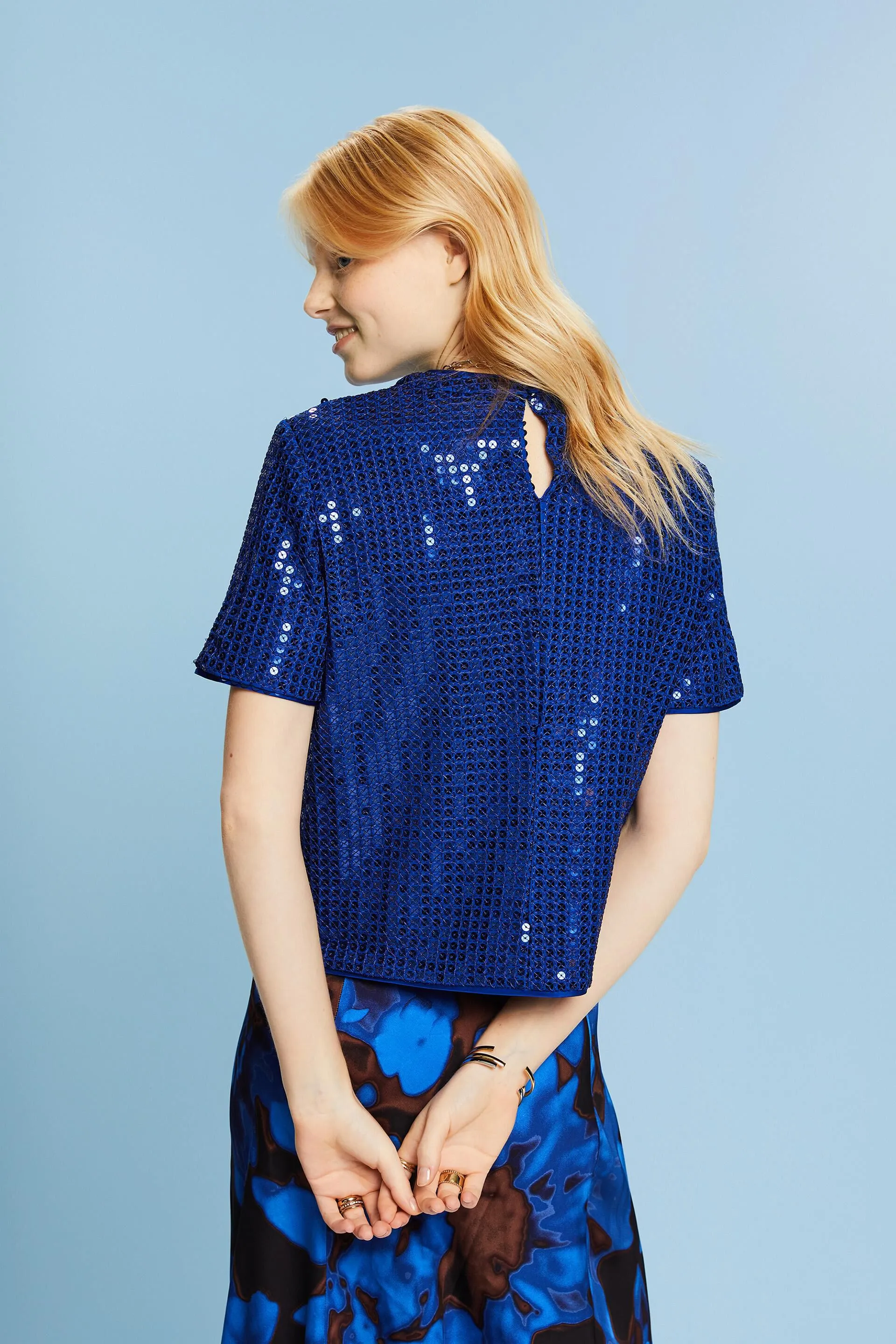 Blusa a maniche corte con paillettes
