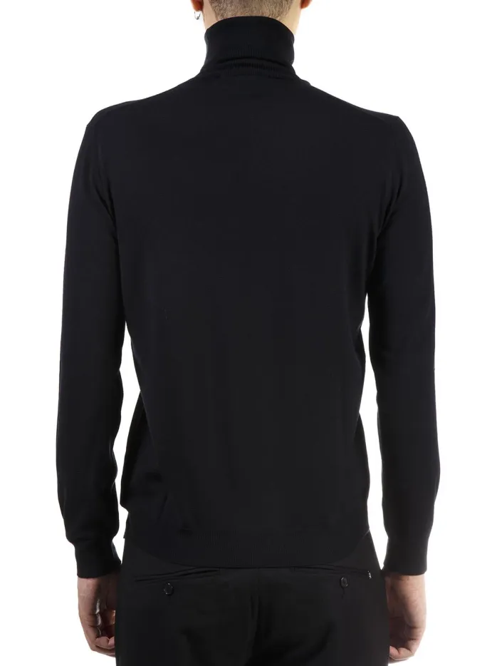 Maglione collo alto blu in lana